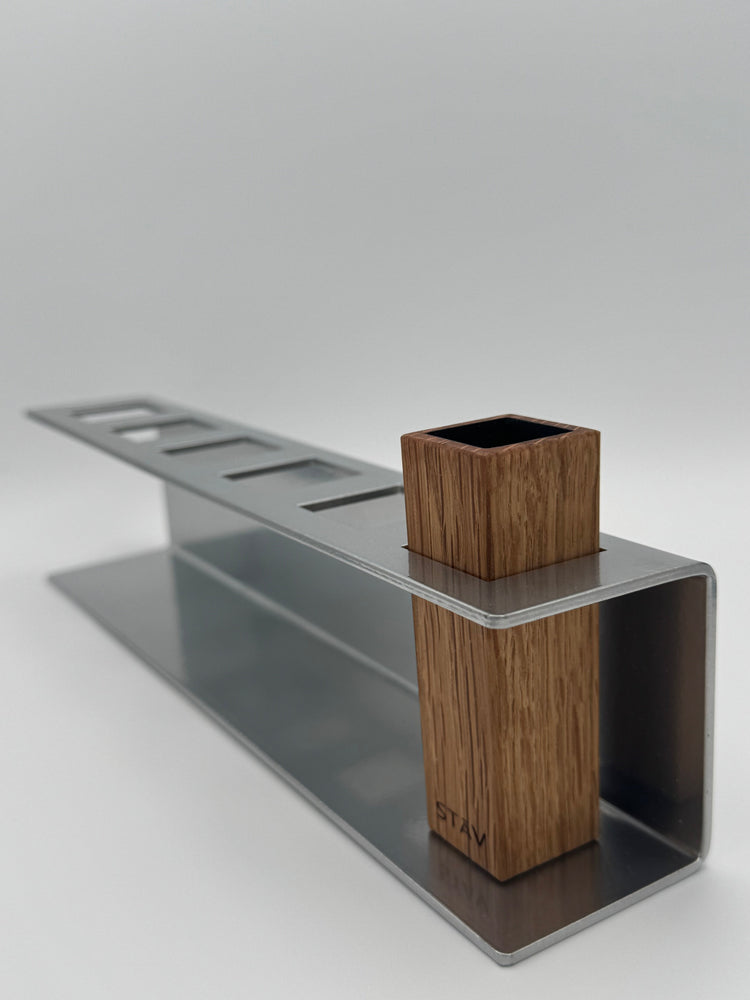 STĀV 6-slot powder-coated metal display rack holding one Oregon oak Barrel Stave Shot